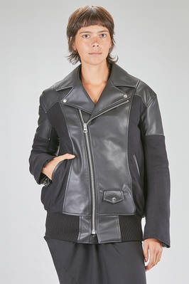 long and lean 'sculpture' biker jacket in polyurethane faux leather and parts in diagonal wool serge  - 74