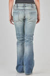 jeans 5 tasche in denim stretch e stone washed di cotone e poliuretano - JUNYA WATANABE 