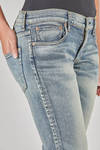 jeans 5 tasche in denim stretch e stone washed di cotone e poliuretano - JUNYA WATANABE 