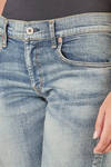 jeans 5 tasche in denim stretch e stone washed di cotone e poliuretano - JUNYA WATANABE 