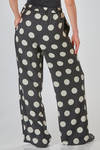 pantalone lungo e ampio in georgette di poliestere con stampa a pois - JUNYA WATANABE 